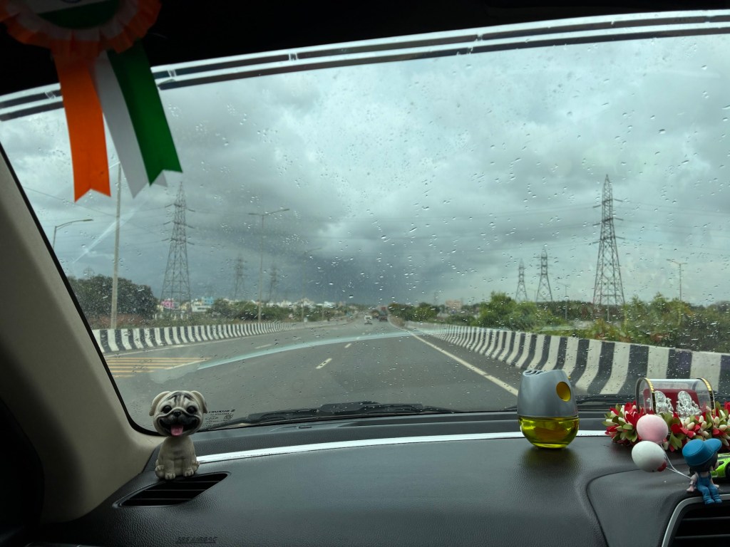 A rainy morning through V's Car