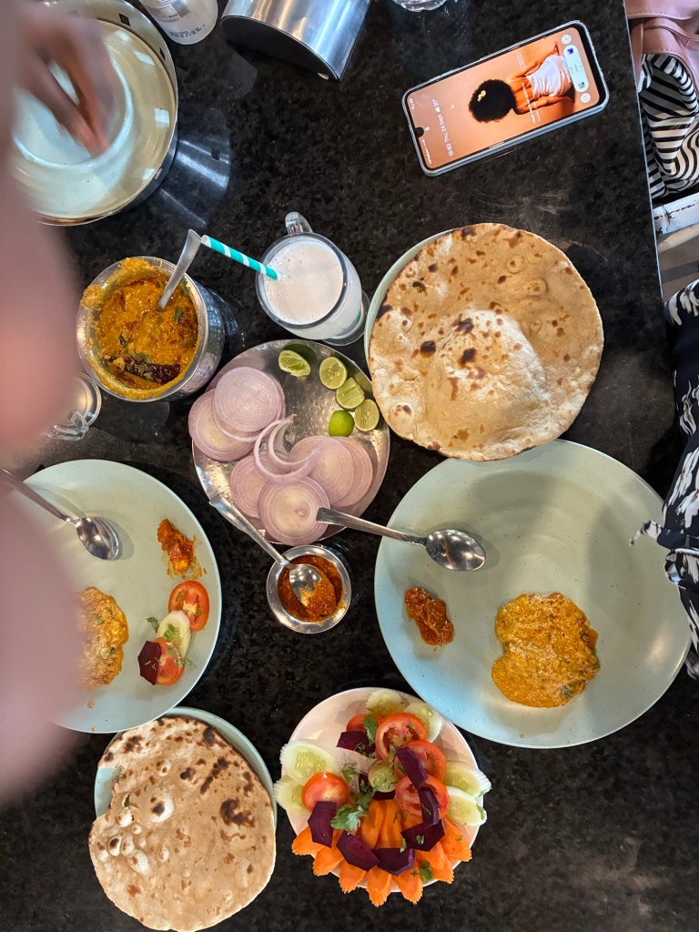 Veg maratha, Tandoori roti, Garlic aan and the salads - lipsmacking food